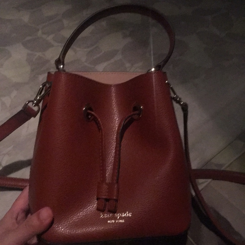 Kate spade bucket bag in red plum color